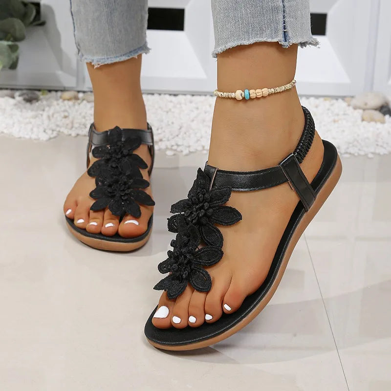 Women Casual Flat Bottom Sandals 2026 Summer New Style Flower Decor Elastic Band Clip Toe Sandals Comfort Non Slip Female Shoes