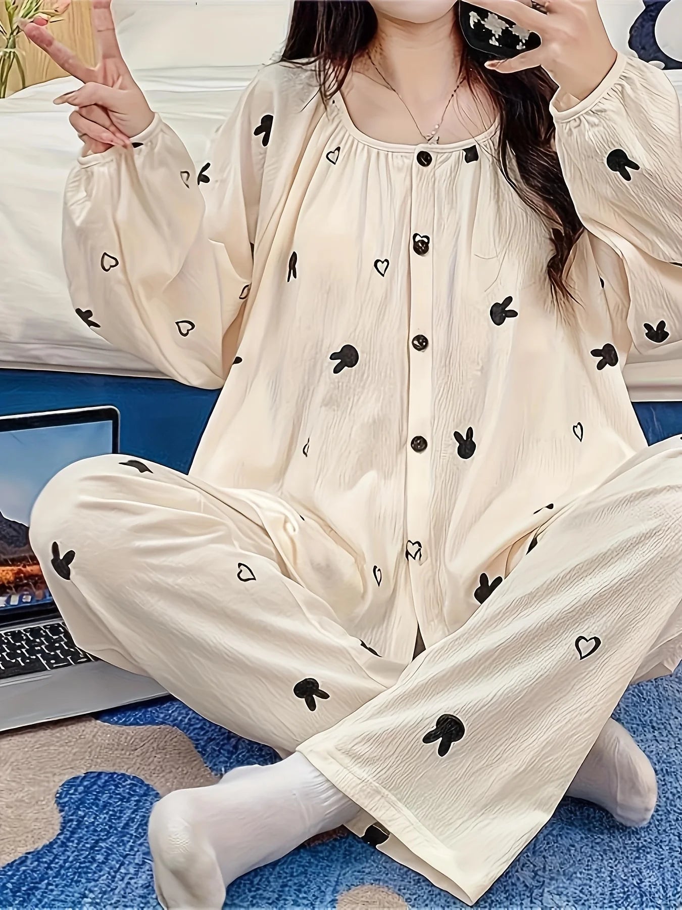 Women's loungewear pajama set features a cardigan - style with a round - neck design, rabbit pattern, long sleeves and long pant