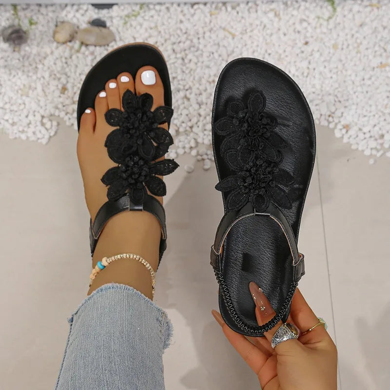 Women Casual Flat Bottom Sandals 2026 Summer New Style Flower Decor Elastic Band Clip Toe Sandals Comfort Non Slip Female Shoes
