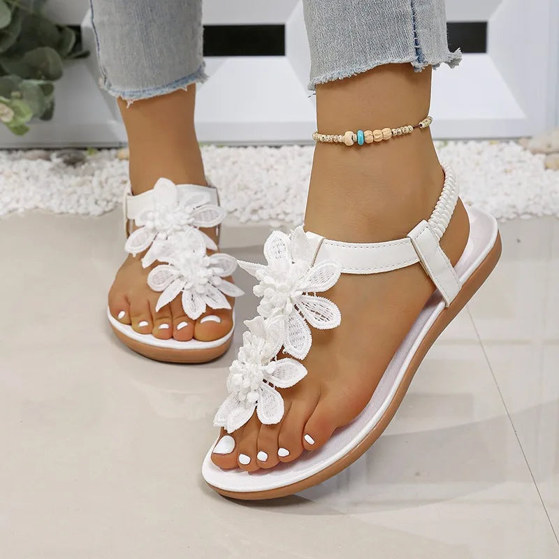 Women Casual Flat Bottom Sandals 2026 Summer New Style Flower Decor Elastic Band Clip Toe Sandals Comfort Non Slip Female Shoes